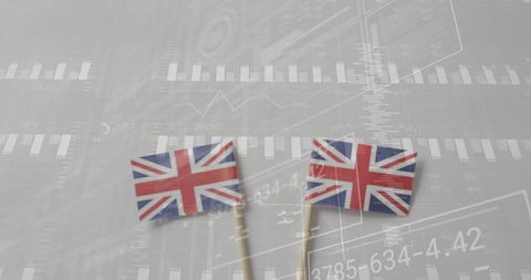 Union jack mini flags with financial data overlay for uk economy, investment and trade