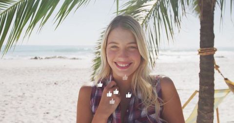 Joyful Woman in Sleeveless Plaid by Beach Palm