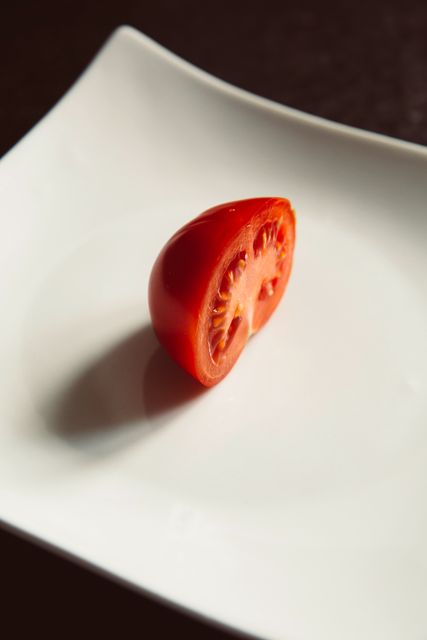 Red Tomato on White Ceramic Plate - Download Free Stock Photos Pikwizard.com