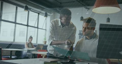 Multiracial business team collaborating in modern office