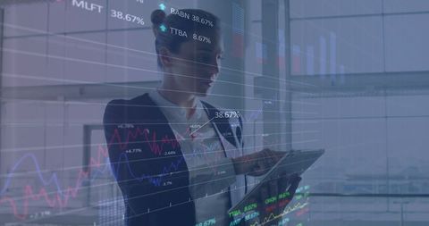 Businesswoman Analyzing Digital Financial Data on Tablet in Modern Office - Download Free Stock Images Pikwizard.com