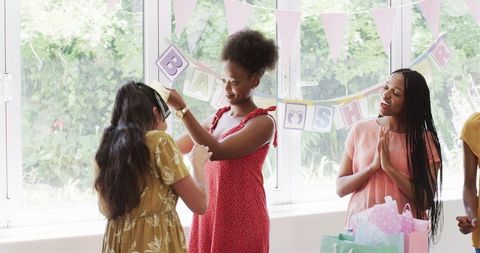 Women Celebrating Together at Joyful Baby Shower Gathering