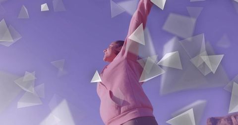 Energetic stretching woman against abstract purple interactive design