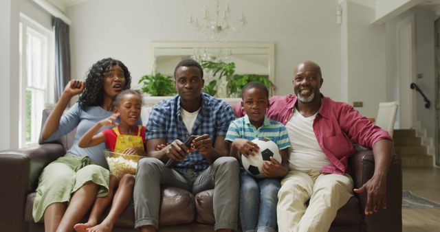 Happy African American Family Enjoying Movie Time at Home - Download Free Stock Images Pikwizard.com