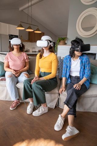 Diverse Friends Experience Virtual Reality in Modern Living Room
