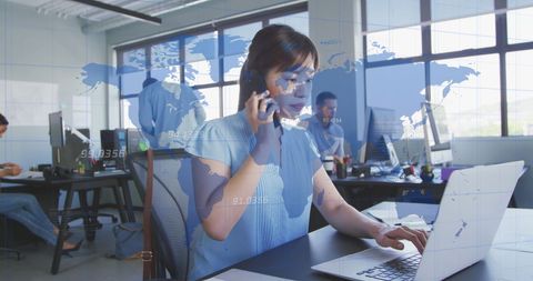 Woman engaged in global business communication with technology