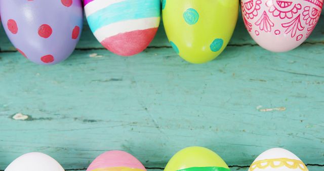 Colorful Easter Eggs on Rustic Wood Background - Download Free Stock Photos Pikwizard.com