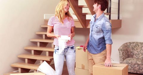 Happy Couple Unpacking in New Home Living Room - Download Free Stock Images Pikwizard.com