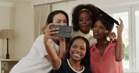 Joyful Graduation Celebration with Selfie and Friendship