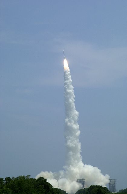 As if perched on top of a candle, the Mars Exploration Rover known as “Spirit” is hurled into space on a Delta II rocket. Liftoff occurred on time at 1:58 p.m. EDT from Launch Complex 17-A, Cape Canaveral Air Force Station. MER-A is the first of two rovers being launched to Mars. When the two rovers arrive at the red planet in 2004, they will bounce to airbag-cushioned landings at sites offering a balance of favorable conditions for safe landings and interesting science. The rovers see sharper images, can explore farther and examine rocks better than anything that has ever landed on Mars. The designated site for the MER-A mission is Gusev Crater, which appears to have been a crater lake. The second rover, MER-B, is scheduled to launch June 25.
