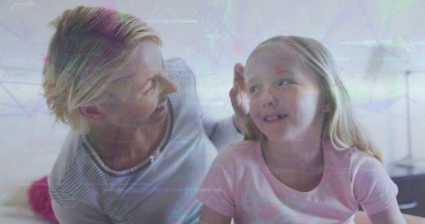 Happy Grandmother and Granddaughter with Digital Connection Overlay