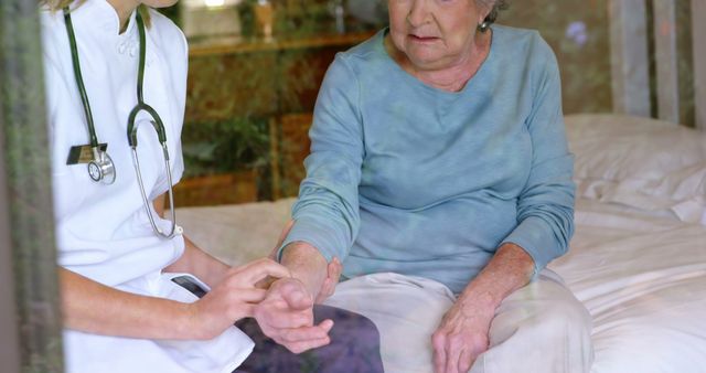 Elderly Woman Receiving Medical Checkup from Healthcare Professional - Download Free Stock Images Pikwizard.com