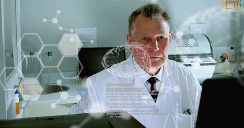 Scientist Analyzing Data on Laptop in High-Tech Laboratory - Download Free Stock Images Pikwizard.com