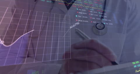 Businessman Analyzing Financial Charts and Data