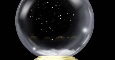 Glowing snowflakes in elegant glass snow globe