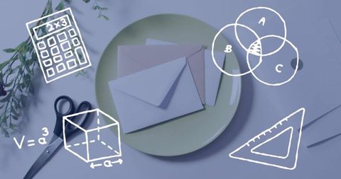 Creative workspace with stationery and mathematical illustrations