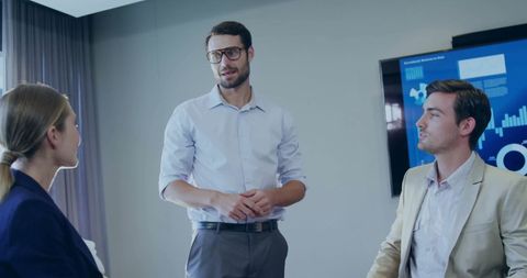 Business Professionals Discussing Data in Modern Office - Download Free Stock Images Pikwizard.com