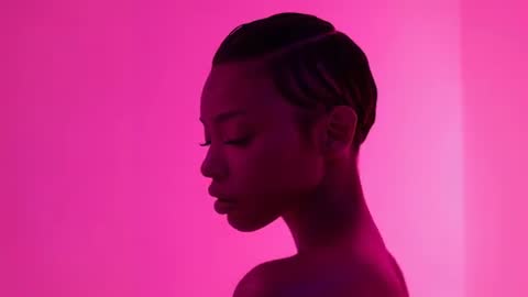 Elegant Portrait of Model in Pink Light