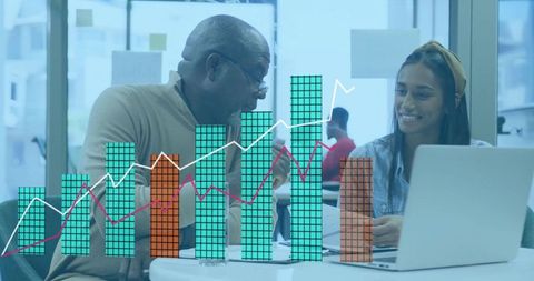 Professionals Collaborating with Technology and Analytics in Modern Office