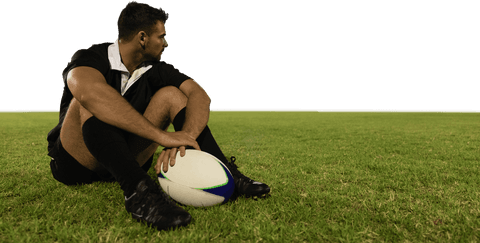 Transparent Rugby Player Resting on Field with Ball in Daylight - Download Free Stock Videos Pikwizard.com
