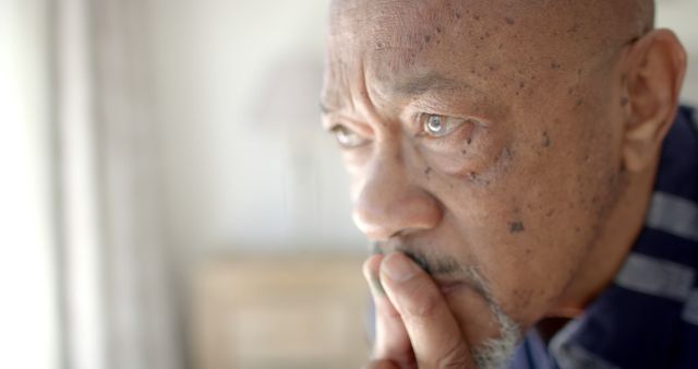 Elderly Man Deep in Thought Staring Out Window - Download Free Stock Images Pikwizard.com