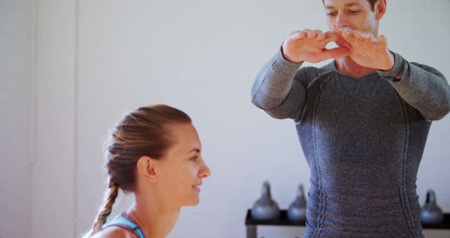 Personal Trainer Engaging Client in Workout Routine - Download Free Stock Images Pikwizard.com