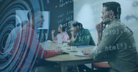 Software team collaborating on code review with holographic data overlay in modern office