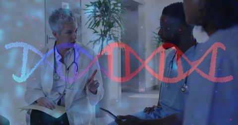 Doctors collaborating on genetic data in hospital setting