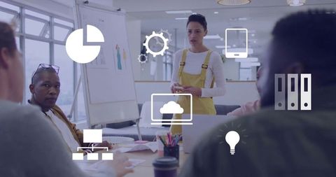 Presenting woman leading creative team in open-plan office with cloud and idea icons