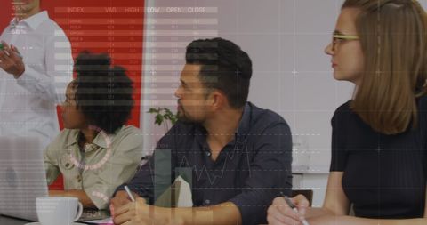 Diverse Team Analyzing Business Analytics in Modern Office - Download Free Stock Images Pikwizard.com