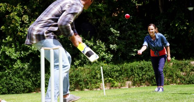 Family Enjoying Outdoor Cricket Game on Sunny Day - Download Free Stock Images Pikwizard.com