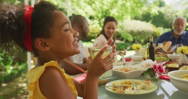 Happy Family Enjoying Garden Meal Together - Download Free Stock Images Pikwizard.com