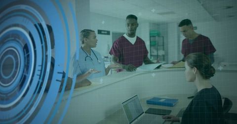 Medical Team Collaborating with Digital Interface at Hospital Desk