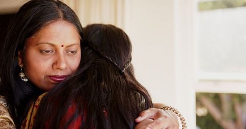 Indian Mother and Daughter Sharing Tender Hug