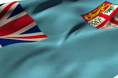 Transparent close-up of fluttering fiji flag with crest detail