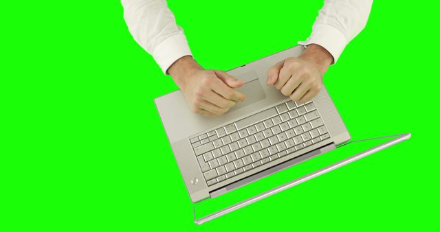 Person Frustrated Using Laptop on Green Background - Download Free Stock Images Pikwizard.com