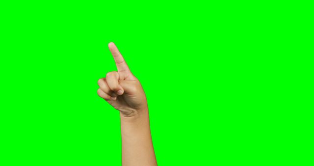 This image features a close-up of a child gesturing against a green screen. It is ideal for use in educational materials, stock photography for digital communication, or tutorials about facial expressions and gestures. The green screen background allows for easy editing and the addition of custom backdrops. Suitable for advertisements, social media content, and websites needing a focus on child interaction.