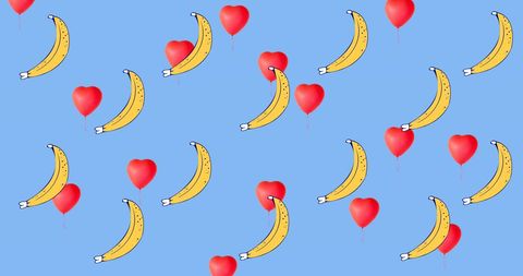 Whimsical Bananas and Red Hearts Pattern on Blue Background