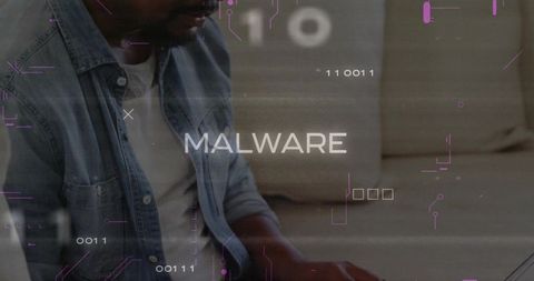 Man typing laptop analyzing malware binary code