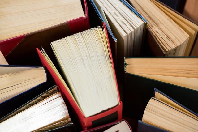 Close-up of various arranged book