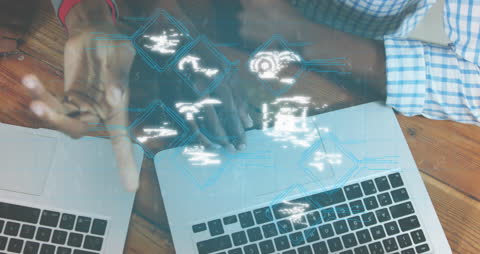 Hands Energetically Gesturing Near Laptops with Animated Icons