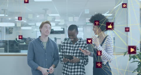 Diverse Team Discussing Ideas with Digital Icons Overlay in Office