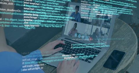 Typing Host Wearing Blue Shirt Hosting Remote Video Conference with Code Overlay
