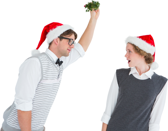 Geeky Hipster Holding Mistletoe Over Woman Wearing Christmas Hats - Download Free Stock Videos Pikwizard.com