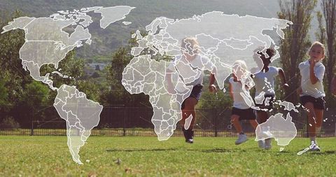Children running on sports field with world map overlay representing global teamwork