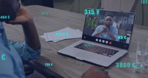 Remote video meeting with financial data overlay on laptop for business collaboration