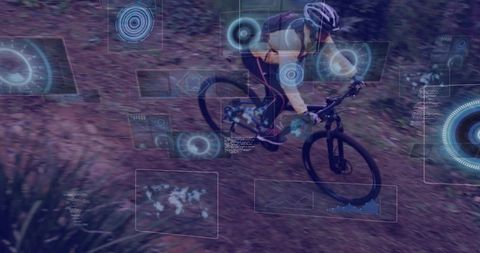 Mountain biker navigating trail with futuristic hud elements