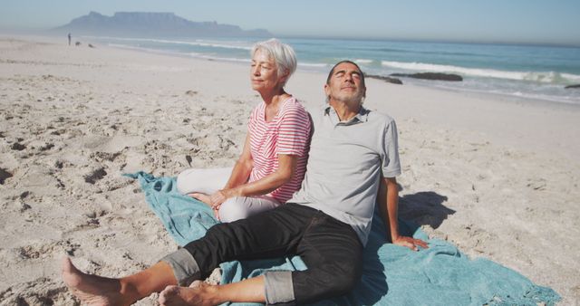 Senior Couple Relaxing and Enjoying Sunny Beach - Download Free Stock Images Pikwizard.com