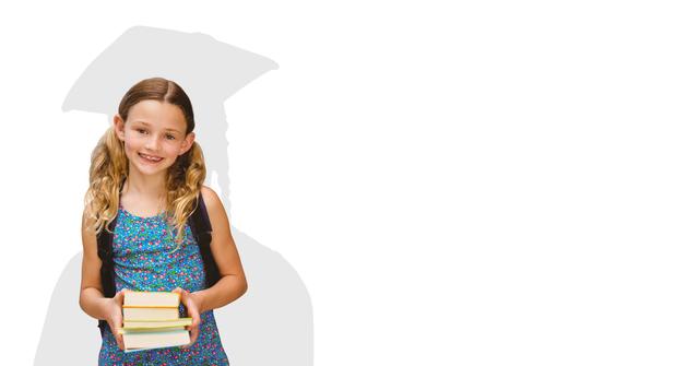 Digital composite of Digitally generated image of smiling girl holding books with shadow of graduate student in backgroun