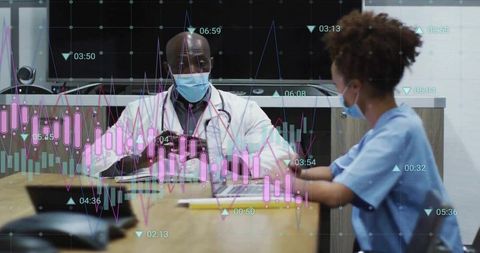 Doctors Analyzing Telemedicine Data on Digital Interface in Clinic